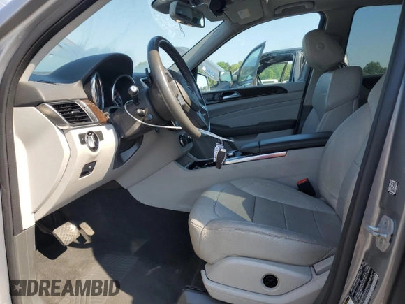 2014 Mercedes-Benz M 350 with VIN 4JGDA2EB4EA406865, listed as a Copart auction lot 61630045 with 142,616 mi miles and Salvage title. Bid and sale history available at DreamBid. Image 7.