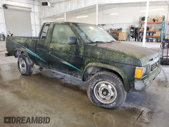 1986 Nissan Hardbody E z VIN 1N6ND16Y7GC413942, wystawiony jako Copart lot #57677605 z przebiegiem 126 183 mil mil oraz Tytuł czysty. Historia ofert i sprzedaży dostępna na DreamBid. Obrazek 4.