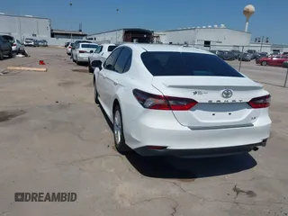 2023 Toyota Camry LE z VIN 4T1C11AKXPU804367, wystawiony jako IAAI lot #42019545 z przebiegiem 23 737 mil mil oraz . Historia ofert i sprzedaży dostępna na DreamBid. Obrazek 3.