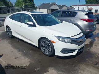 2016 Honda Civic EX-T with VIN 19XFC1F32GE217673, listed as a IAAI auction lot 42521367 with 126,505 mi miles and . Bid and sale history available at DreamBid. Image 1.
