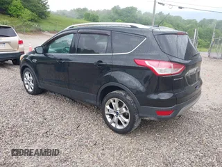 2016 Ford Escape Titanium with VIN 1FMCU9J93GUB93729, listed as a IAAI auction lot 42177294 with 158,859 mi miles and . Bid and sale history available at DreamBid. Image 3.
