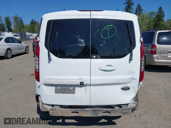 2014 Ford Transit Connect XLT z VIN NM0GS9F75E1141212, wystawiony jako IAAI lot #42691464 z przebiegiem 101 475 mil mil oraz . Historia ofert i sprzedaży dostępna na DreamBid. Obrazek 17.