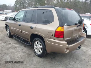2003 GMC Envoy SLE with VIN 1GKDT13S332264984, listed as a IAAI auction lot 41523191 with 227,004 mi miles. Bid and sale history available at carsss.com. Image 3.