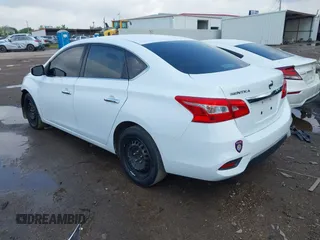 2018 Nissan Sentra S z VIN 3N1AB7AP6JY240649, wystawiony jako IAAI lot #42123511 z przebiegiem 132 478 mil mil oraz . Historia ofert i sprzedaży dostępna na DreamBid. Obrazek 3.