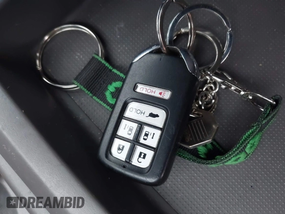 2015 Honda Odyssey Touring Elite with VIN 5FNRL5H92FB089627, listed as a IAAI auction lot 41115013 with Not Provided miles and . Bid and sale history available at DreamBid. Image 11.