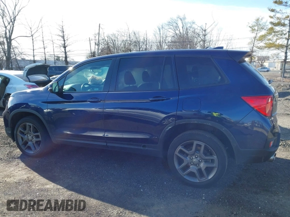2023 Honda Passport EX-L with VIN 5FNYF8H51PB028045, listed as a IAAI auction lot 41609342 with 52,920 mi miles and . Bid and sale history available at DreamBid. Image 15.