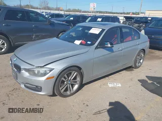 2014 BMW 3 Series 328d with VIN WBA3D3C59EK156427, listed as a IAAI auction lot 41737929 with 160,431 mi miles and . Bid and sale history available at carsss.com. Image 2.