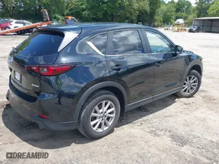 2023 Mazda CX-5 2.5 S Carbon Edition with VIN JM3KFBCMXP0201665, listed as a IAAI auction lot 39965378 with 29,105 mi miles. Bid and sale history available at carsss.com. Image 4.