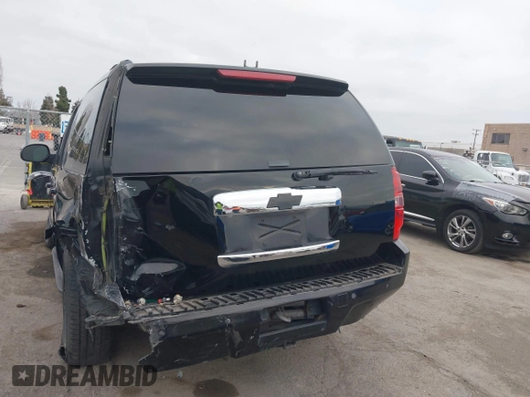 2013 Chevrolet Tahoe LT with VIN 1GNSKBE05DR152825, listed as a IAAI auction lot 41450863 with 157,305 mi miles and . Bid and sale history available at DreamBid. Image 17.