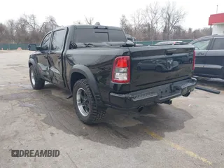 2022 Ram 1500 Big Horn with VIN 1C6SRFFT3NN287385, listed as a IAAI auction lot 41793596 with 12,277 mi miles and . Bid and sale history available at DreamBid. Image 3.