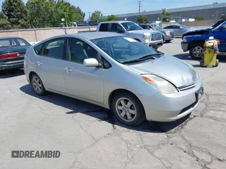 2004 Toyota Prius z VIN JTDKB20U040101157, wystawiony jako IAAI lot #42200752 z przebiegiem 255 846 mil mil oraz . Historia ofert i sprzedaży dostępna na DreamBid. Obrazek 1.
