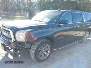 2015 GMC Yukon XL SLT with VIN 1GKS1HKC0FR675450, listed as a IAAI auction lot 41558343 with 187,814 mi miles. Bid and sale history available at carsss.com. Image 2.