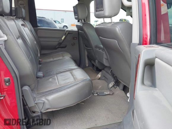 2005 Nissan Titan SE with VIN 1N6BA07B35N500027, listed as a IAAI auction lot 42150226 with 200,877 mi miles. Bid and sale history available at carsss.com. Image 8.