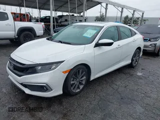 2021 Honda Civic Sedan EX-L with VIN 19XFC1F77ME205128, listed as a IAAI auction lot 41562202 with 82,257 mi miles. Bid and sale history available at carsss.com. Image 2.