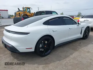 2022 Porsche Taycan z VIN WP0AA2Y12NSA13356, wystawiony jako IAAI lot #42083009 z przebiegiem Nie podano mil oraz . Historia ofert i sprzedaży dostępna na DreamBid. Obrazek 4.