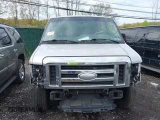 2014 Ford Econoline Passenger XL z VIN 1FBNE3BL3EDA67454, wystawiony jako IAAI lot #42186097 z przebiegiem Nie podano mil oraz . Historia ofert i sprzedaży dostępna na DreamBid. Obrazek 11.