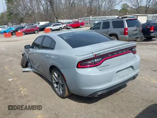 2020 Dodge Charger SXT with VIN 2C3CDXBG9LH232833, listed as a IAAI auction lot 41812035 with 63,391 mi miles. Bid and sale history available at carsss.com. Image 3.