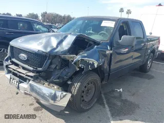 2005 Ford F-150 XLT with VIN 1FTRW12W95FA28428, listed as a IAAI auction lot 41645714 with 189,275 mi miles. Bid and sale history available at carsss.com. Image 2.