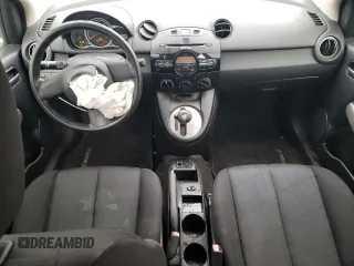2012 Mazda 2 Sport with VIN JM1DE1KY1C0140803, listed as a Copart auction lot 83420714 with 153,730 mi miles and Salvage Title. Bid and sale history available at DreamBid. Image 8.