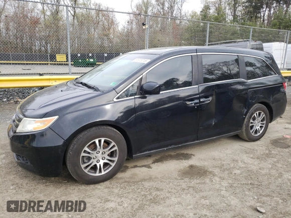2012 Honda Odyssey EX-L with VIN 5FNRL5H67CB025164, listed as a Copart auction lot 51873715 with 110,260 mi miles and Salvage Title. Bid and sale history available at carsss.com. Image 1.