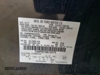 2017 Ford Taurus SHO z VIN 1FAHP2KT5HG129779, wystawiony jako Copart lot #58891315 z przebiegiem 168 244 mil mil oraz Szkoda całkowita • Salvage title. Historia ofert i sprzedaży dostępna na DreamBid. Obrazek 12.