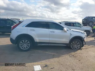 2021 Cadillac XT4 FWD Premium Luxury with VIN 1GYFZCR47MF084998, listed as a IAAI auction lot 41483283 with 1 mi miles. Bid and sale history available at carsss.com. Image 12.