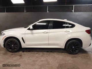 2019 BMW X6 sDrive35i with VIN 5UXKU0C5XK0S97686, listed as a IAAI auction lot 40436492 with 105,584 mi miles. Bid and sale history available at carsss.com. Image 14.