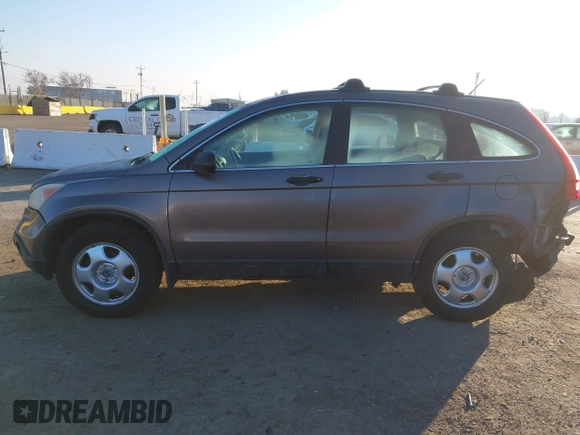 2009 Honda CR-V LX with VIN 5J6RE48389L011915, listed as a IAAI auction lot 41301796 with 214,807 mi miles. Bid and sale history available at carsss.com. Image 15.