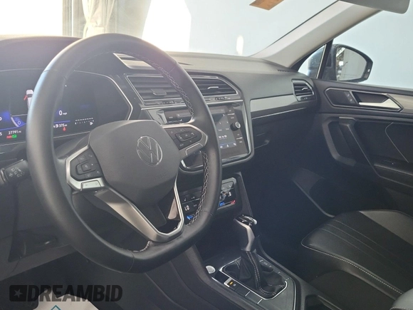 2024 Volkswagen Tiguan SE with VIN 3VV3B7AX8RM107014, listed as a IAAI auction lot 42734341 with 27,789 mi miles and . Bid and sale history available at DreamBid. Image 49.