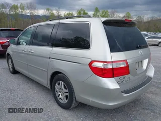 2005 Honda Odyssey EX-L with VIN 5FNRL38795B083325, listed as a IAAI auction lot 42034632 with 183,865 mi miles. Bid and sale history available at carsss.com. Image 6.