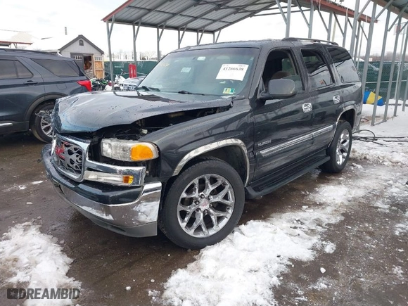 2003 GMC Yukon SLT with VIN 1GKEC13Z63R166721, listed as a IAAI auction lot 41266638 with 246,888 mi miles. Bid and sale history available at carsss.com. Image 2.