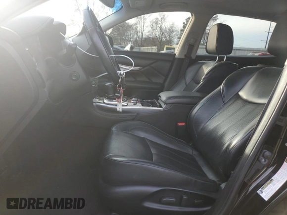 2015 Infiniti Q70 z VIN JN1BY1PR1FM830745, wystawiony jako Copart lot #84815474 z przebiegiem 137 489 mil mil oraz Szkoda całkowita • Salvage title. Historia ofert i sprzedaży dostępna na DreamBid. Obrazek 7.