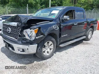 2017 Nissan Titan SV with VIN 1N6AA1E58HN542504, listed as a IAAI auction lot 42564921 with 161,555 mi miles and . Bid and sale history available at DreamBid. Image 2.