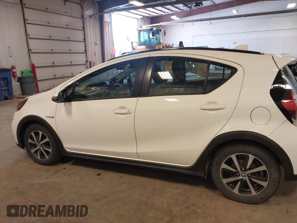 2018 Toyota Prius One with VIN JTDKDTB35J1599642, listed as a IAAI auction lot 42031112 with 58,801 mi miles and . Bid and sale history available at DreamBid. Image 14.