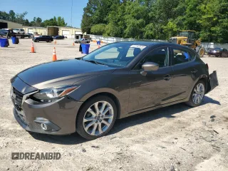 2014 Mazda 3 S Grand Touring with VIN JM1BM1M38E1192454, listed as a Copart auction lot 61742575 with 121,993 mi miles and Salvage title. Bid and sale history available at DreamBid. Image 1.