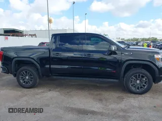 2021 GMC Sierra 1500 AT4 z VIN 1GTP9EELXMZ304412, wystawiony jako IAAI lot #41069878 z przebiegiem 48 987 mil mil oraz . Historia ofert i sprzedaży dostępna na DreamBid. Obrazek 13.