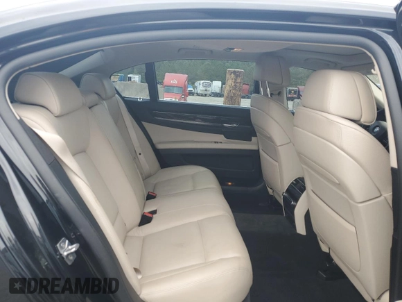 2012 BMW 7 Series 740Li with VIN WBAKB4C59CC576476, listed as a Copart auction lot 55670215 with 100,907 mi miles and Salvage title. Bid and sale history available at DreamBid. Image 10.