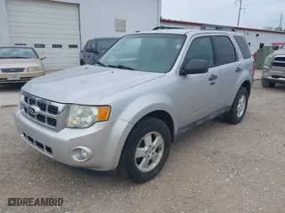 2011 Ford Escape XLT with VIN 1FMCU9D72BKB26439, listed as a IAAI auction lot 41914514 with 242,172 mi miles. Bid and sale history available at carsss.com. Image 2.