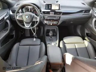 2021 BMW X2 xDrive28i with VIN WBXYJ1C07M5S52616, listed as a Copart auction lot 70234144 with 96,459 mi miles and Salvage Title. Bid and sale history available at carsss.com. Image 8.