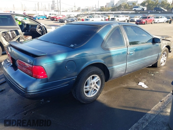 1997 Ford Thunderbird LX z VIN 1FALP62W4VH115924, wystawiony jako IAAI lot #41251348 z przebiegiem Nie podano mil oraz . Historia ofert i sprzedaży dostępna na DreamBid. Obrazek 4.