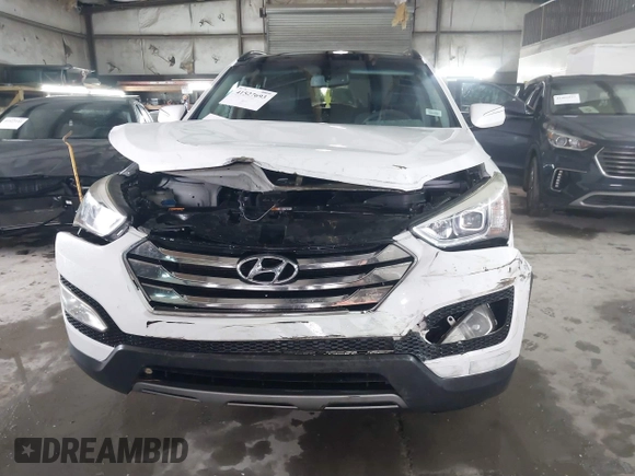 2014 Hyundai Santa Fe Sport with VIN 5XYZU3LB9EG140446, listed as a IAAI auction lot 41527693 with 129,610 mi miles. Bid and sale history available at carsss.com. Image 6.