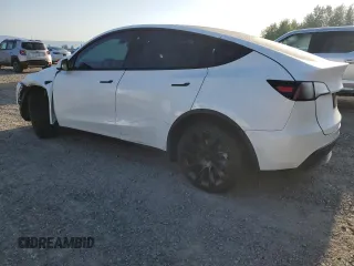 2022 Tesla Model Y Long Range with VIN 7SAYGAEE7NF376795, listed as a Copart auction lot 55113135 with 66,796 mi miles and Salvage Title. Bid and sale history available at carsss.com. Image 2.