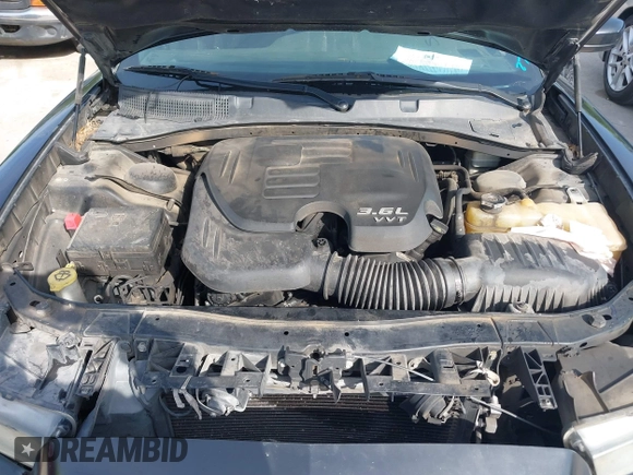 2014 Dodge Charger SE with VIN 2C3CDXBG9EH329419, listed as a IAAI auction lot 42025607 with 166,875 mi miles. Bid and sale history available at carsss.com. Image 10.