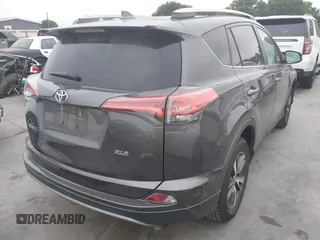 2018 Toyota RAV4 XLE with VIN 2T3WFREV1JW512476, listed as a IAAI auction lot 42177733 with 132,207 mi miles and . Bid and sale history available at DreamBid. Image 4.