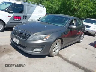 2015 Kia Optima LX z VIN 5XXGM4A77FG356930, wystawiony jako IAAI lot #42261299 z przebiegiem 248 635 mil mil oraz . Historia ofert i sprzedaży dostępna na DreamBid. Obrazek 2.