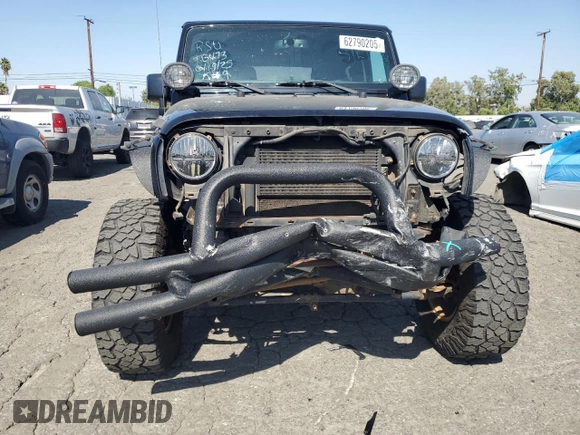 2017 Jeep Wrangler Sport z VIN 1C4GJWAG4HL753650, wystawiony jako Copart lot #62790205 z przebiegiem 52 550 mil mil oraz Szkoda całkowita • Salvage title. Historia ofert i sprzedaży dostępna na DreamBid. Obrazek 5.