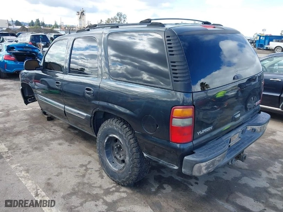 2003 GMC Yukon SLT with VIN 1GKEC13T53R298171, listed as a IAAI auction lot 41738495 with 237,669 mi miles. Bid and sale history available at carsss.com. Image 3.