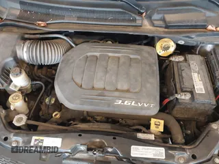 2016 Dodge Grand Caravan SE with VIN 2C4RDGBG1GR117200, listed as a IAAI auction lot 42104773 with 121,007 mi miles and . Bid and sale history available at DreamBid. Image 10.