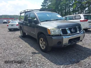 2006 Nissan Titan SE with VIN 1N6AA07B76N519256, listed as a IAAI auction lot 42769436 with 211,208 mi miles and . Bid and sale history available at DreamBid. Image 1.