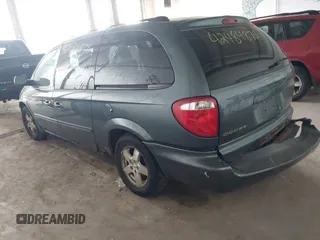 2005 Dodge Caravan SXT with VIN 2D4GP44L25R431882, listed as a IAAI auction lot 42484876 with 242,096 mi miles and . Bid and sale history available at DreamBid. Image 3.